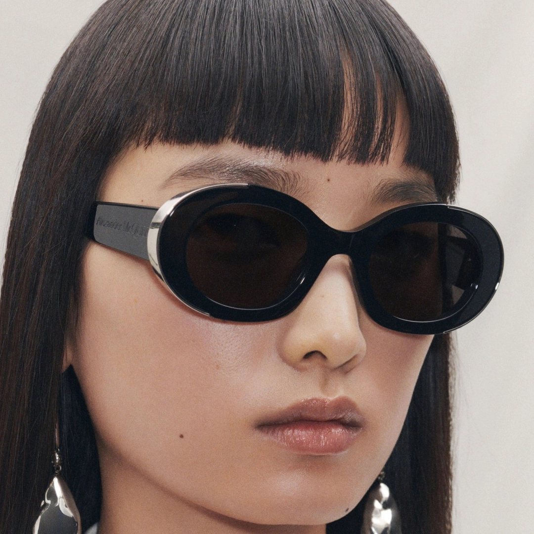 Dramatic and edgy Alexander McQueen eyeglasses with unique detailing.